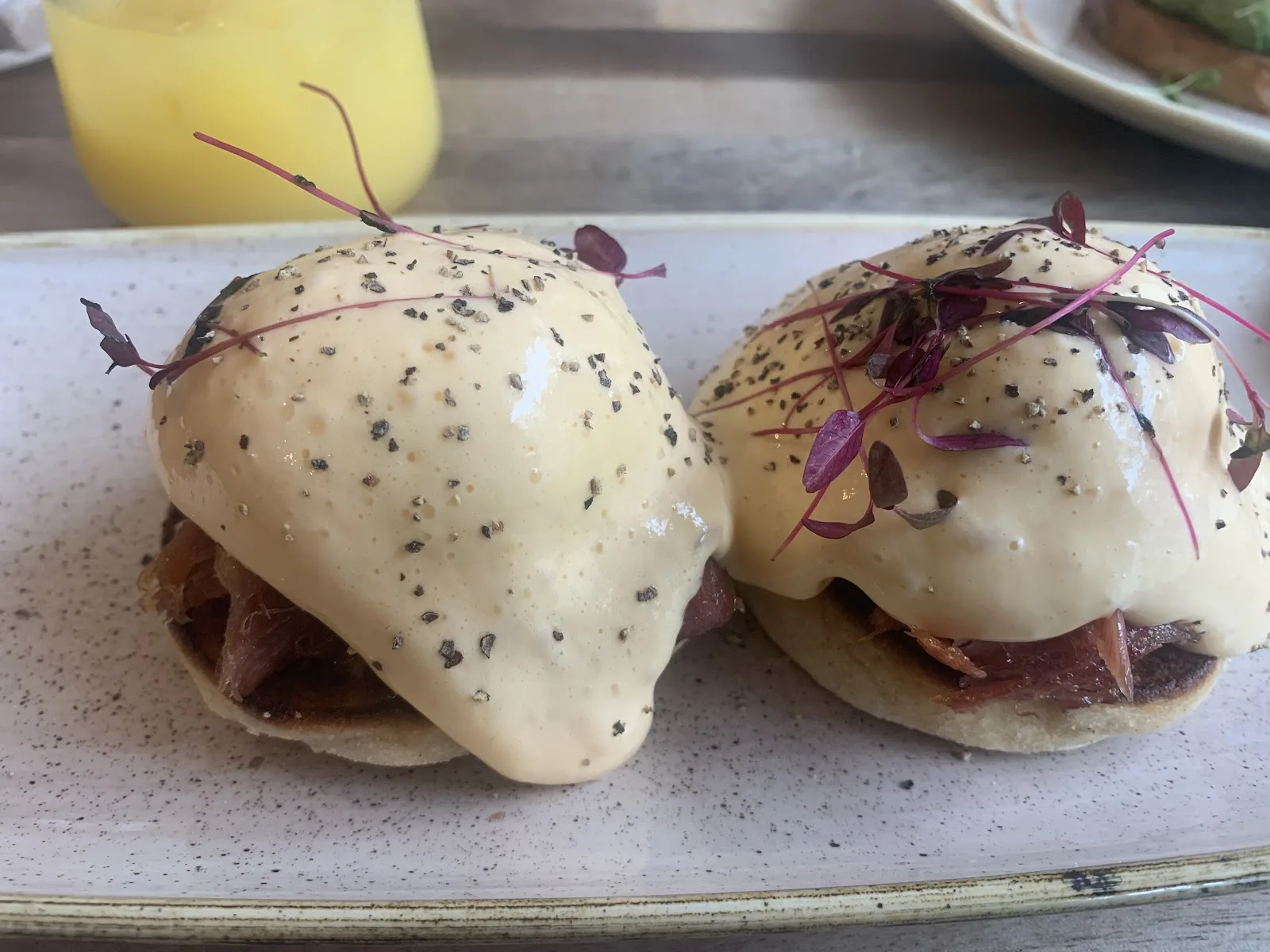 Two eggs benedict with ham and hollandaise on toasted muffins at Ethos, Havant